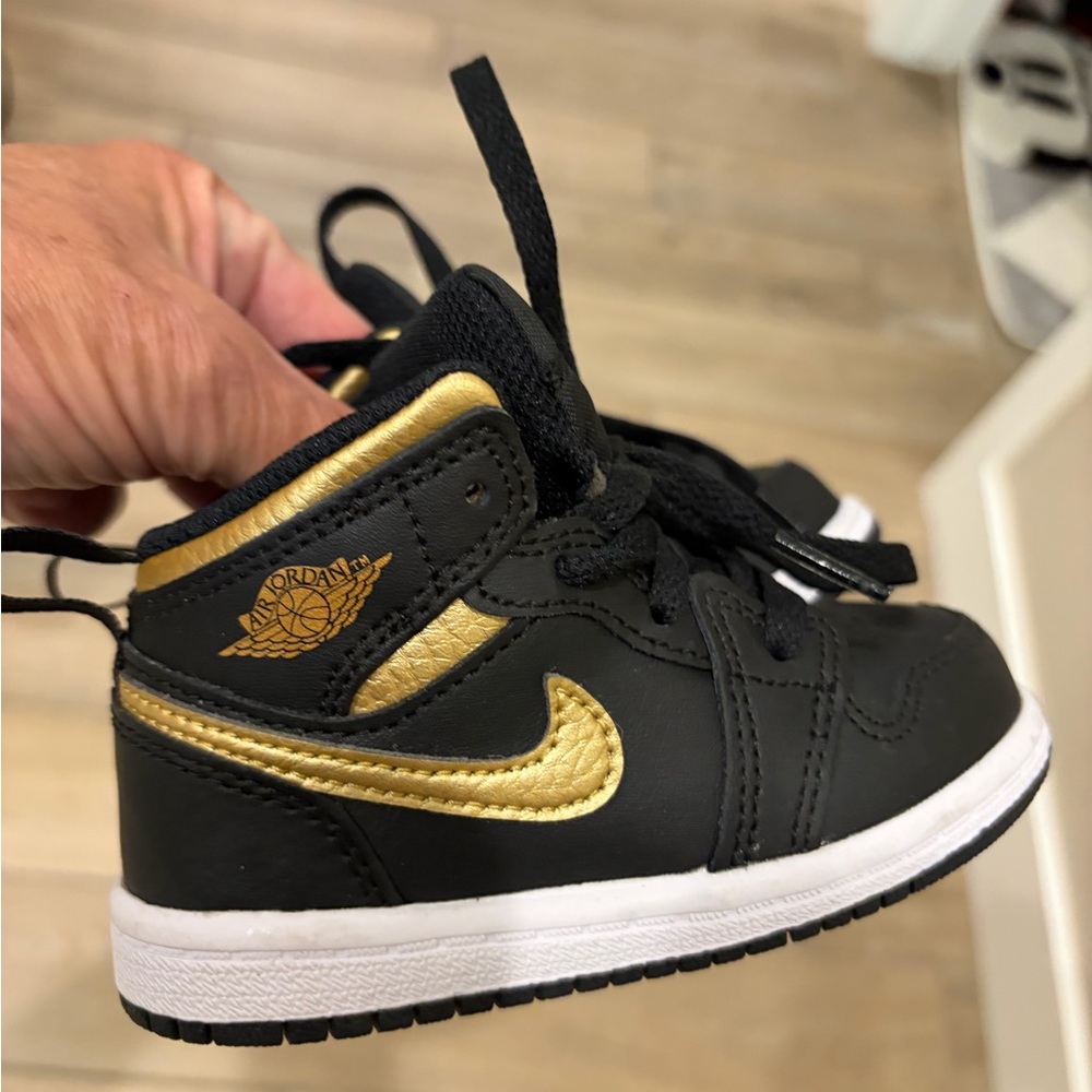 Jordan Kids' Black and Gold High-Top Sneakers size 6 toddler